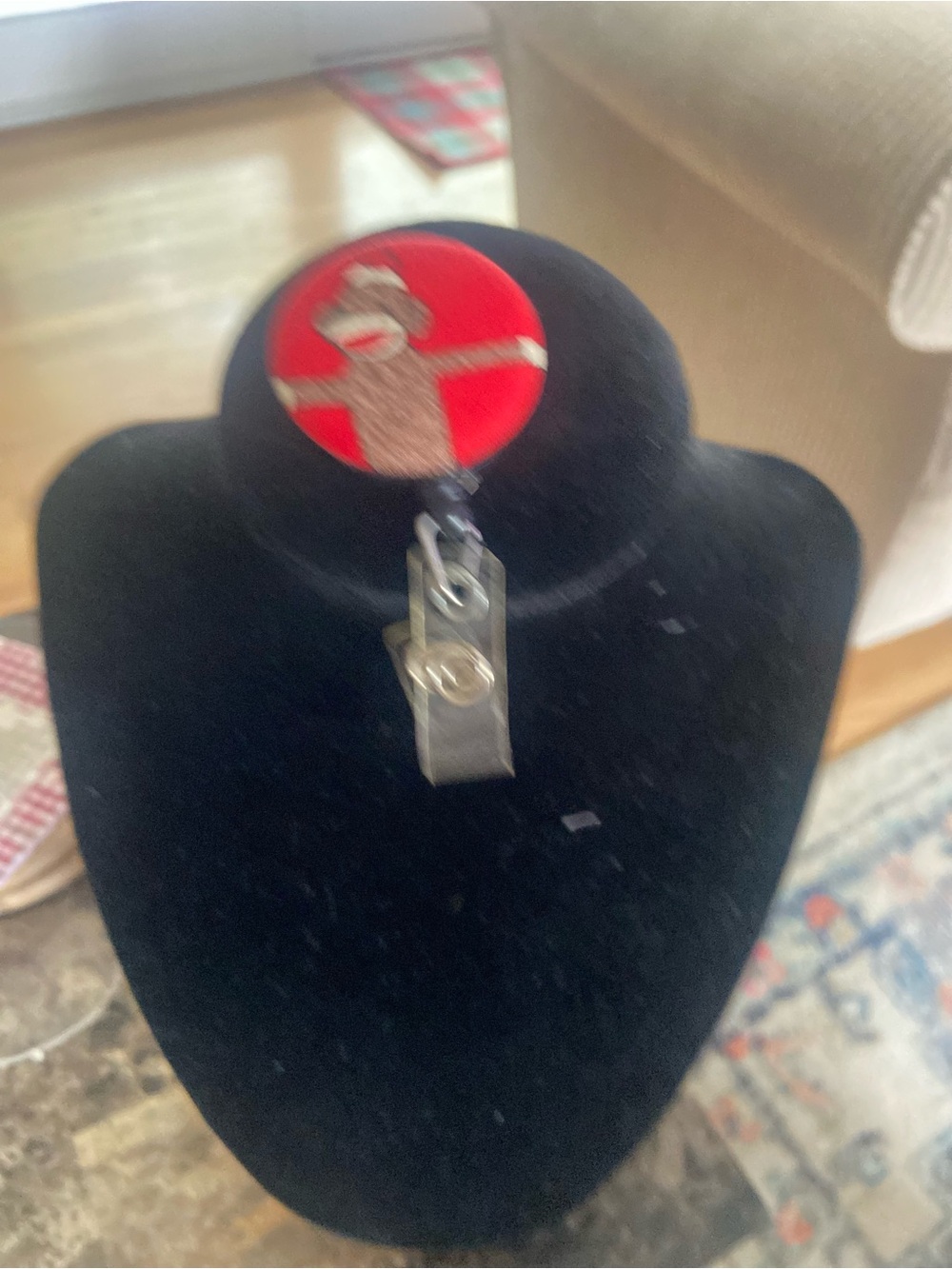 Red Circle Sock Monkey Badge Reel